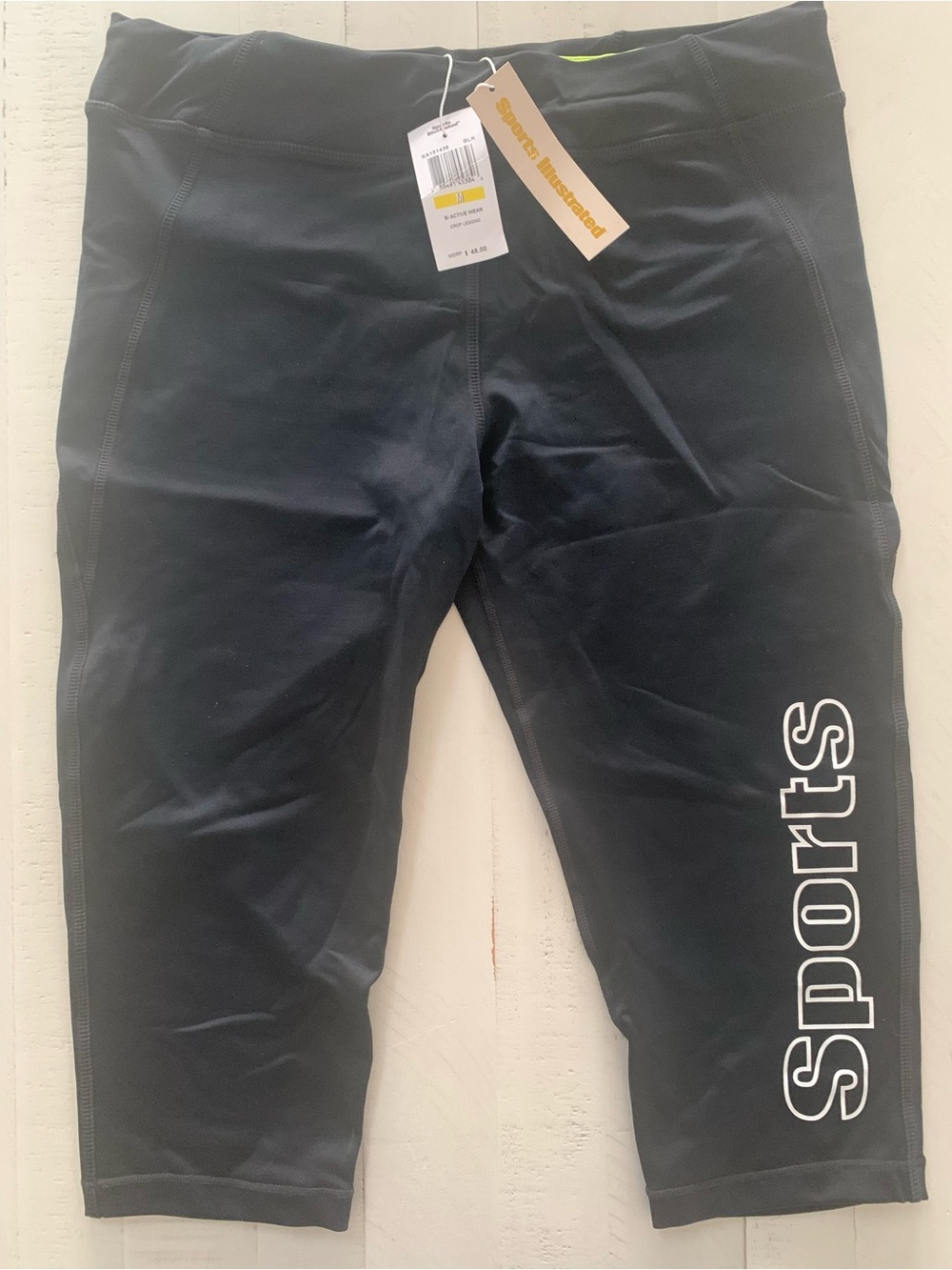 Sports Illustrated Black Cropped Leggings with White 'Sports' Logo